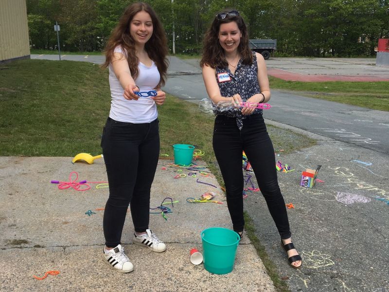 Bubble blowing at the Gray Arena Site event
