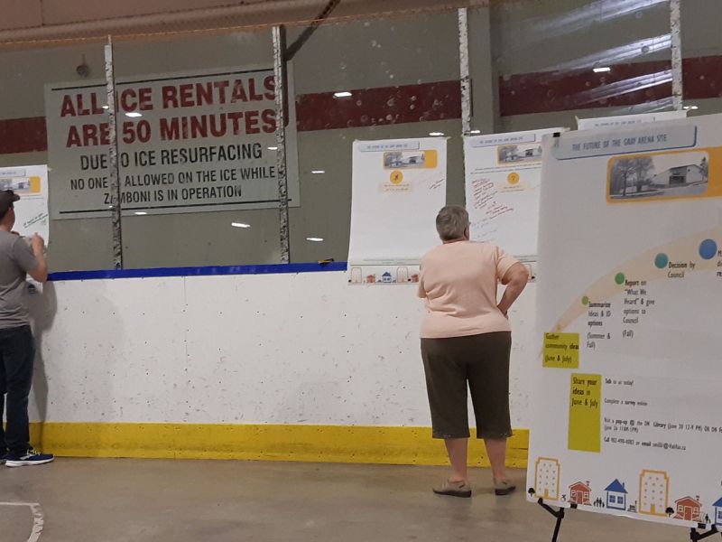 Checking out the information board...